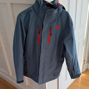 The North Face Men's blue jacket with orange accents